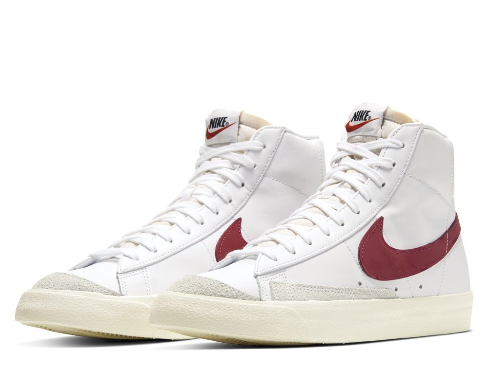 white and red nike blazers